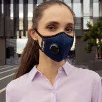 Woman wearing STYLESEAL AIR+ KN95 mask in royal blue