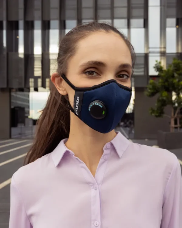 Woman wearing STYLESEAL AIR+ KN95 mask in royal blue